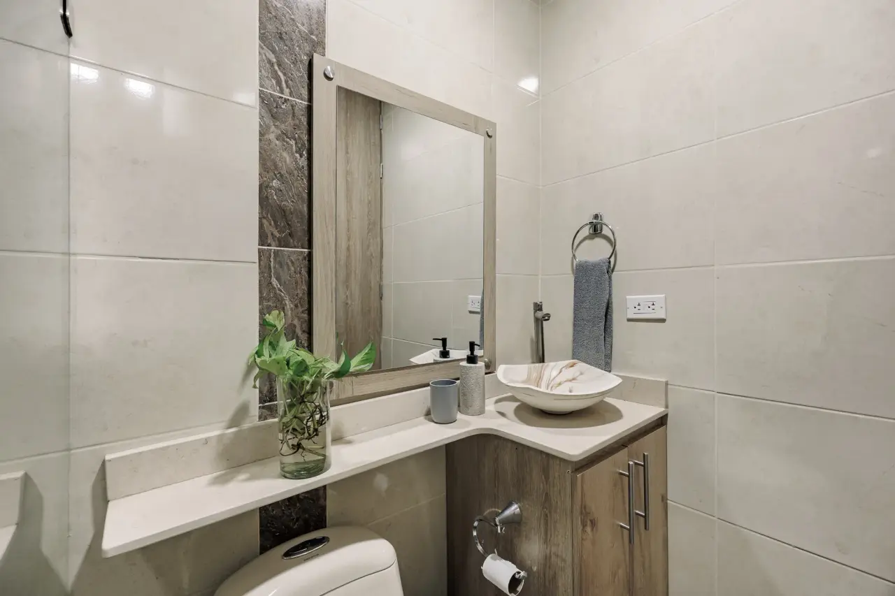 Bathroom vanity and mirror at Casa Roble