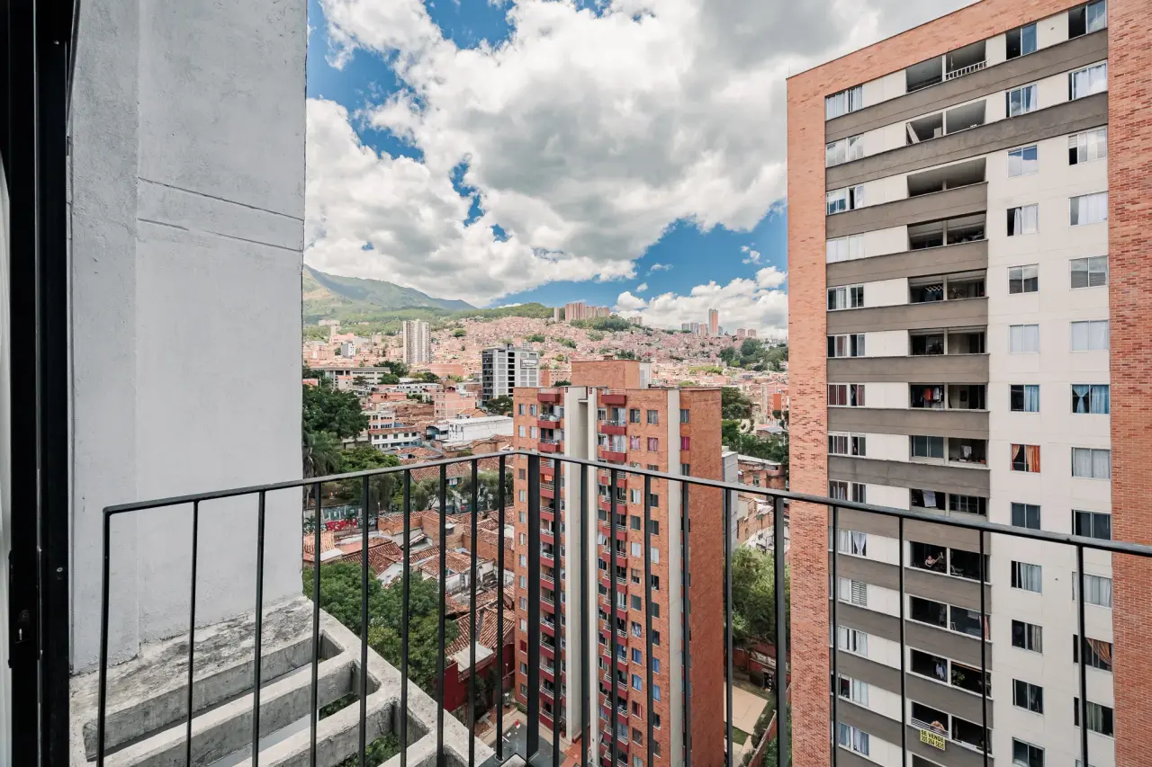 The rooftops of Centro and the mountains, from the private balcony